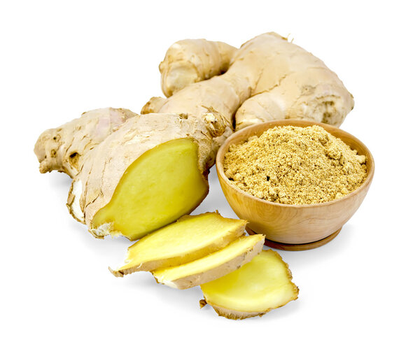 Ginger powder in wooden bowl with root