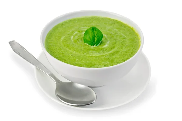 Zupa przecier ze szpinakiem w misce i łyżka — Zdjęcie stockowe