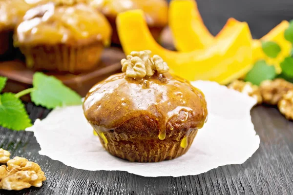 Small Pumpkin Cupcake Orange Glaze Walnuts Parchment Mint Sprigs Wooden — Stock Photo, Image