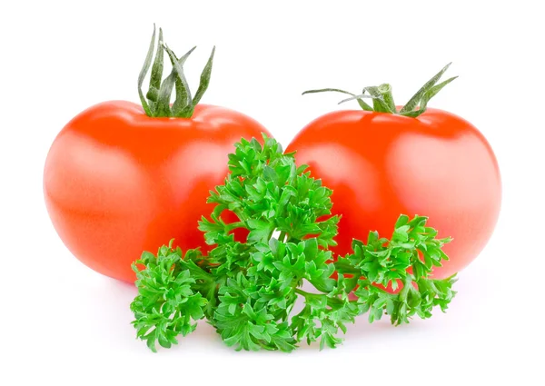 Iki kırmızı sulu domates ve taze maydanoz üzerinde beyaz bir bac izole — Stok fotoğraf