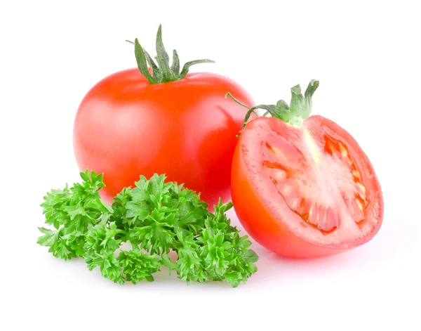 Pomodoro fresco succoso tagliato a metà e un rametto di prezzemolo isolato o — Foto Stock