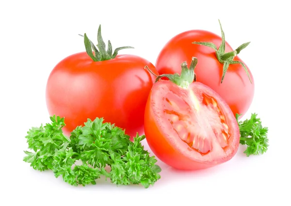 Dos tomates jugosos frescos cortados por la mitad y una ramita de perejil Isolat —  Fotos de Stock