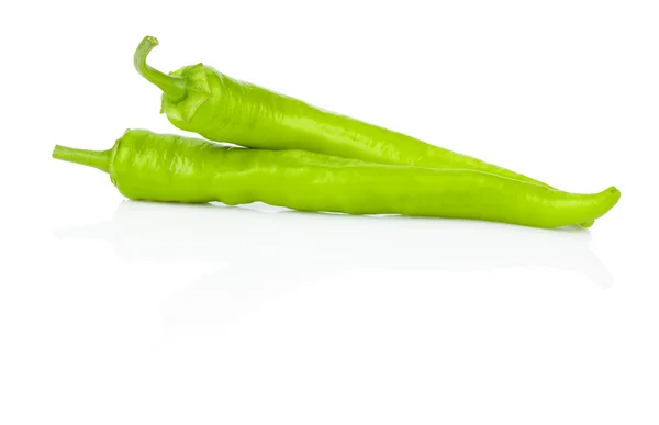 Due peperoncini verdi su fondo bianco — Foto Stock