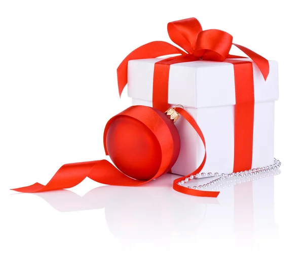 White boxs tied with a red satin ribbon bow, christmas ball and — Stock Photo, Image