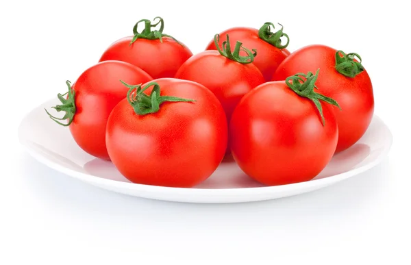 Assiette blanche de tomates rouges juteuses isolée sur fond blanc — Photo