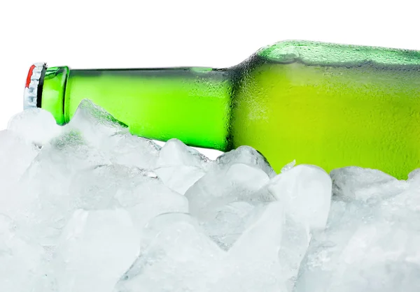 Close-up Green Bottle with Condensation cool in ice isolated on — Stock Photo, Image