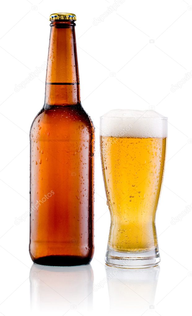 Glass of beer and Brown bottle with drops isolated on a white ba