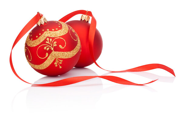 Two Red christmas decoration balls with ribbon bow isolated on w