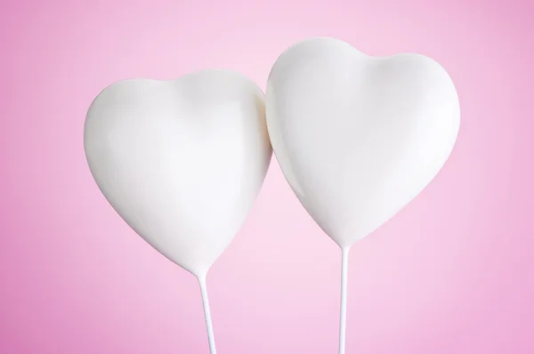 Two white hearts on a pink background — Stock Photo, Image