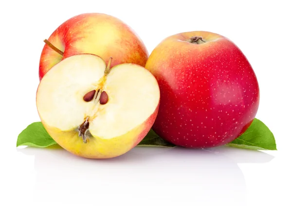 Two red apples and half with green leaves isolated on a white ba — Stock Photo, Image