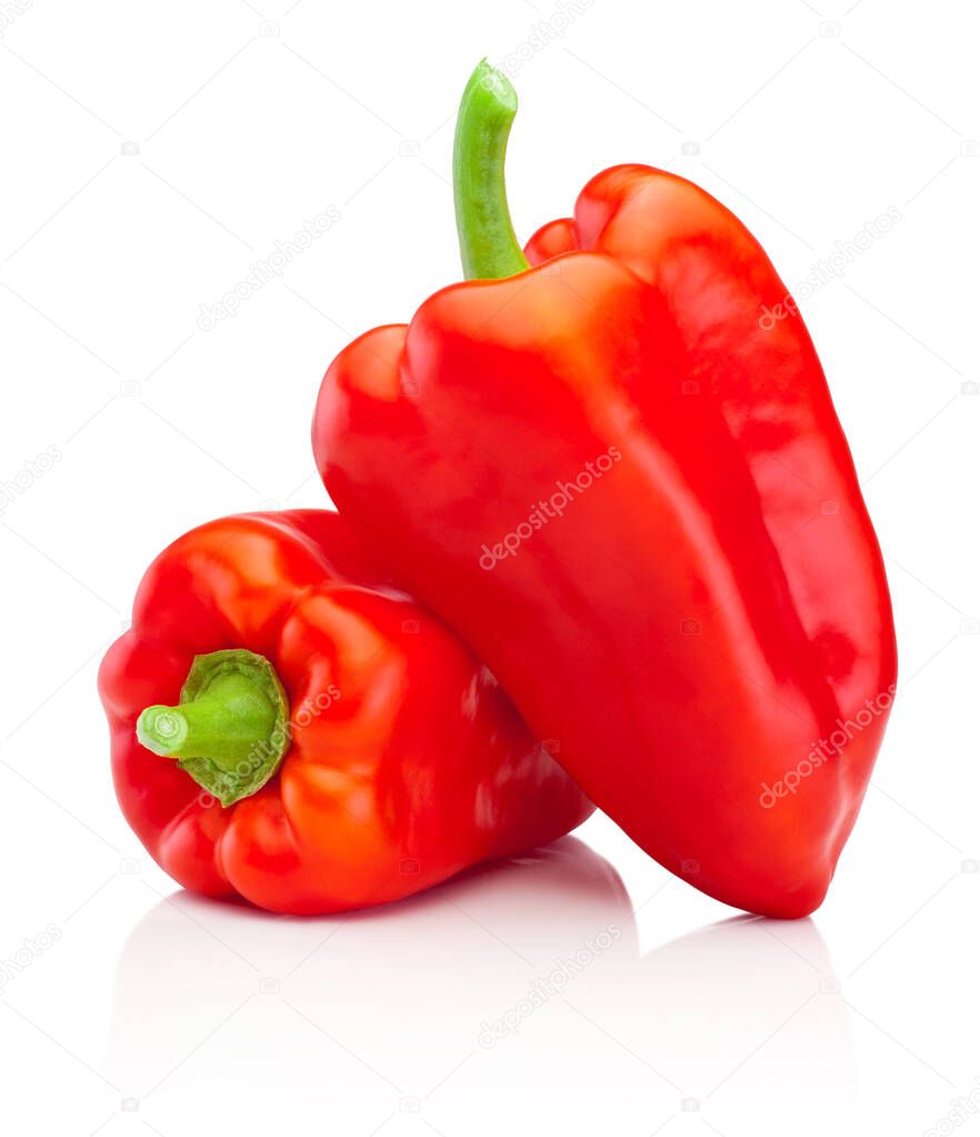 Two red sweet bell peppers isolated on a white background