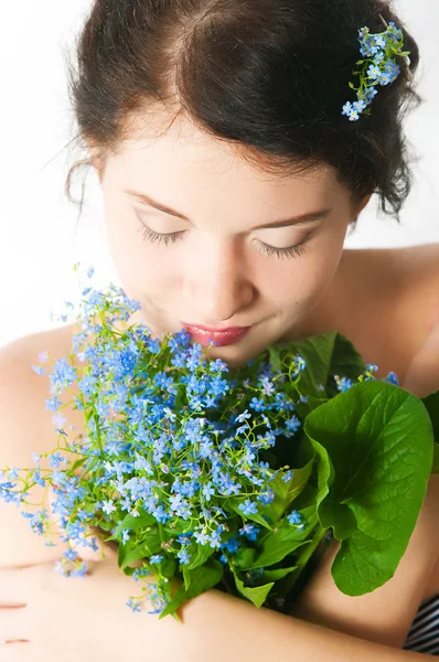 Portrait of the girl with forget-me-nots — Stock Photo, Image