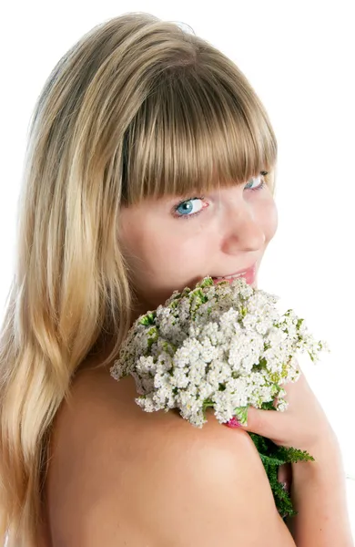 Flickan med blommor — Stockfoto