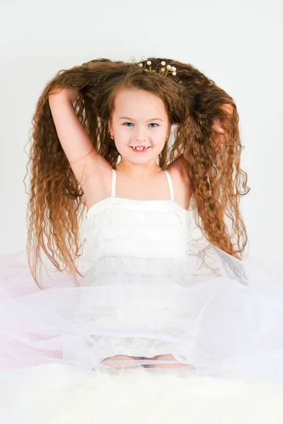 The beautiful girl with long hair — Stock Photo, Image