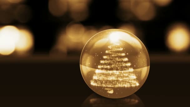 Золотий скляний м'яч зі снігом і світлом — стокове відео