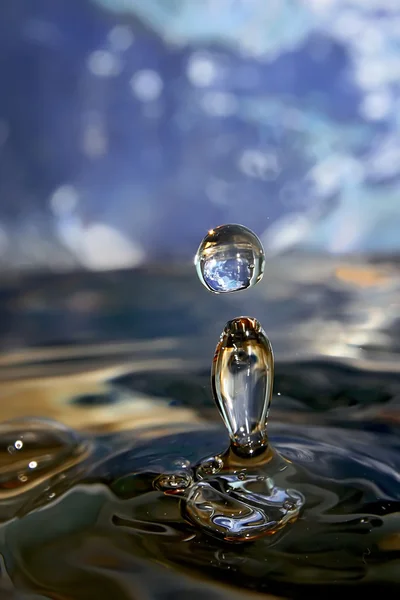 Earth in drop of water. — Stock Photo, Image