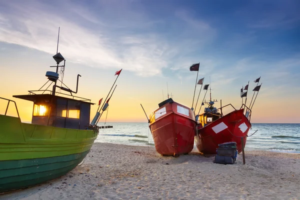 Sights of Poland. Sunset at Baltic sea with fishing boats. — Stock Photo, Image