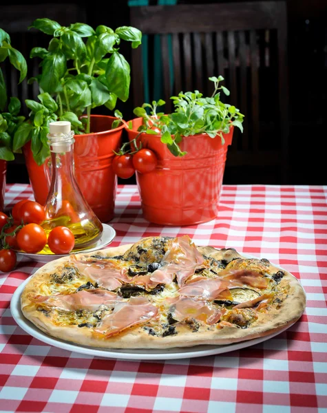 Pizza with ham, olives and other additives — Stock Photo, Image