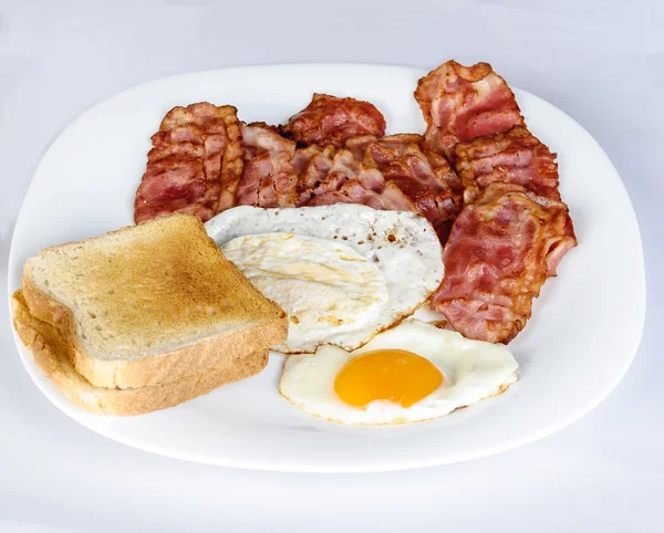 Egg and bacon with toast — Stock Photo, Image