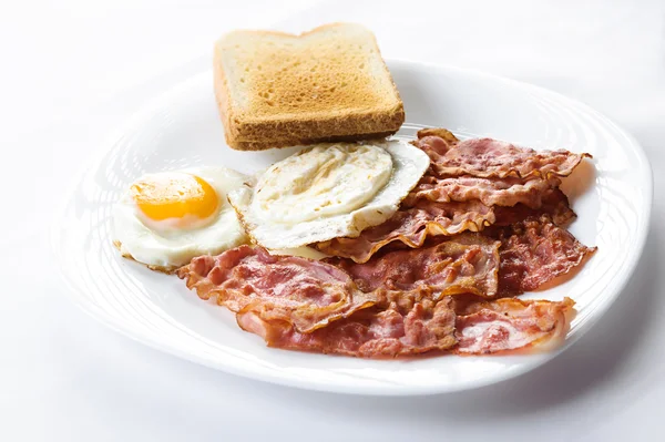 Egg and bacon with toast — Stock Photo, Image