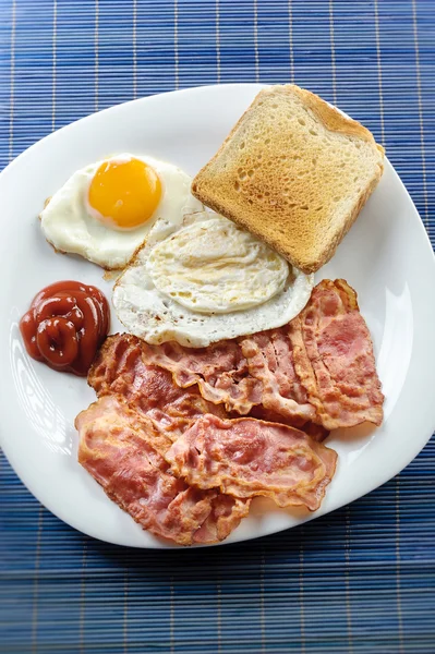 Egg and bacon with toast Stock Image