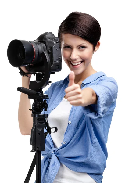 Pretty woman-photographer takes pictures — Stock Photo, Image