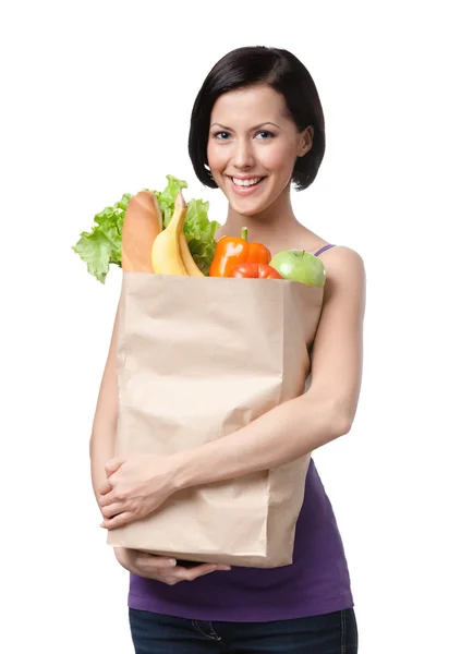 Fille attrayante avec le paquet de fruits et légumes. Perte — Photo