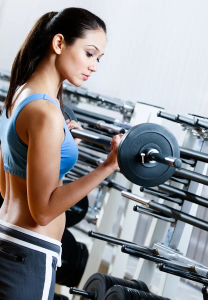 Woman with dumbbells — Stock Photo, Image