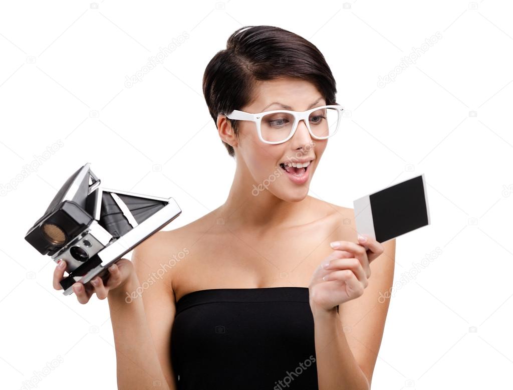 Lady takes snapshots with cassette photographic camera