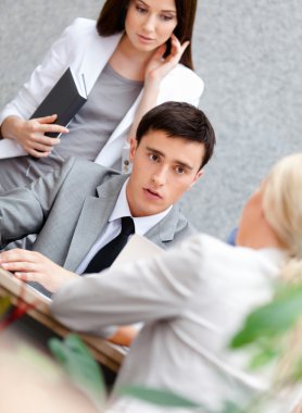 Businessman at the seminar with his employees