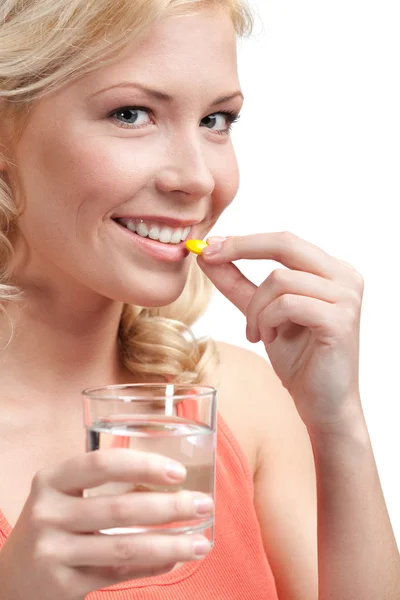 Lady takes antibiotics — Stock Photo, Image