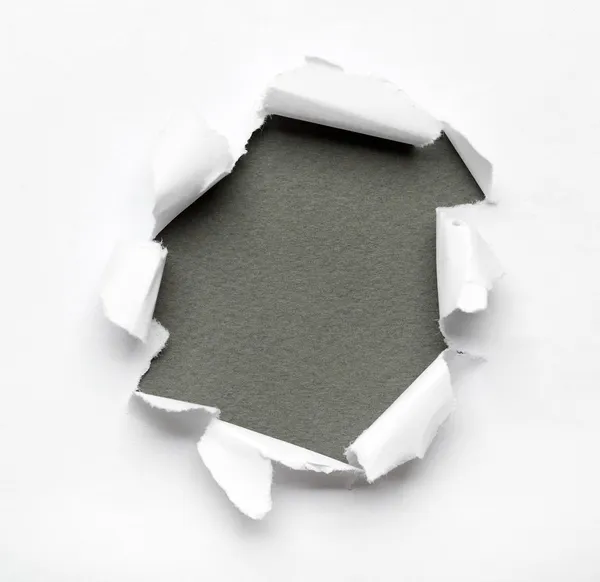 Breakthrough paper hole — Stock Photo, Image