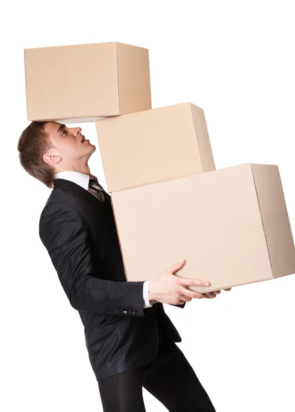 Manager keeping pile of pasteboard boxes — Stock Photo, Image