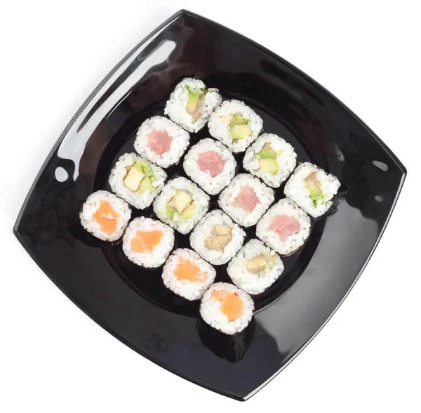 Svart rektangel plattan med sushi — Stockfoto
