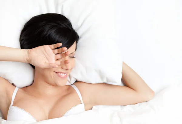 Sleeping woman in the wonderful bed — Stock Photo, Image