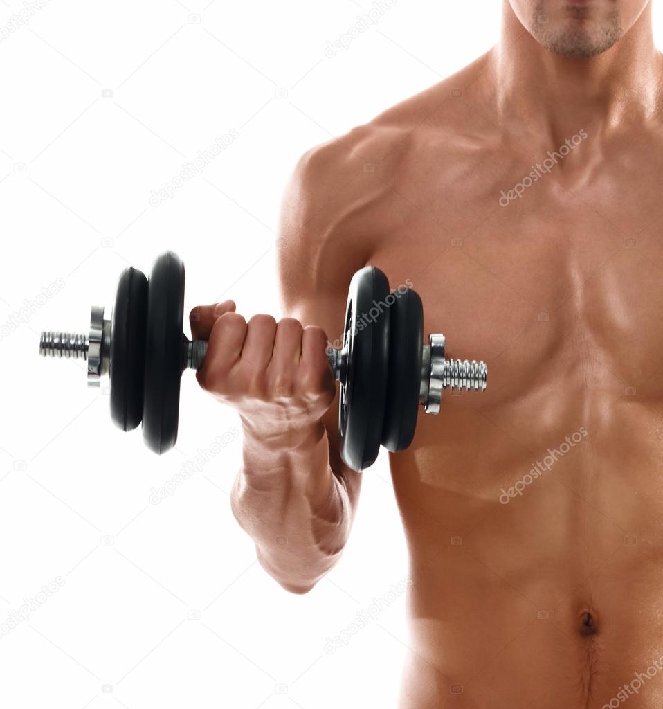 Sexy body of muscular man lifting weight