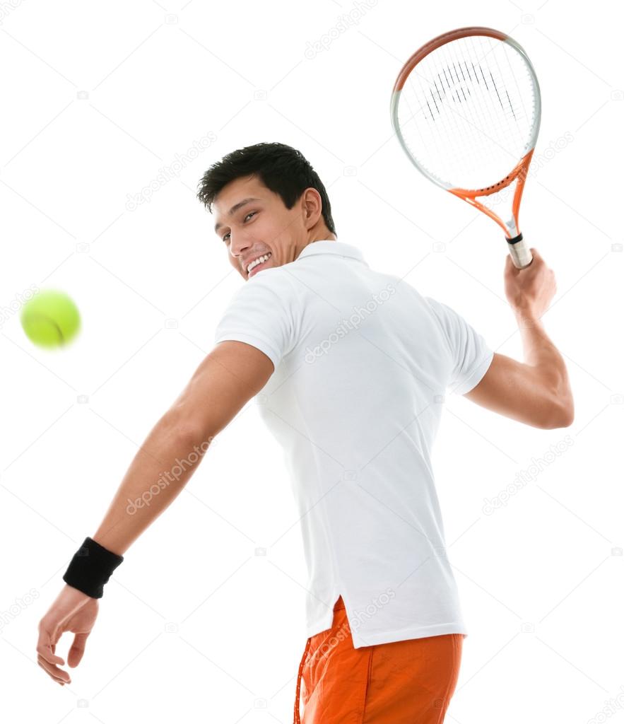 Sportive man playing tennis