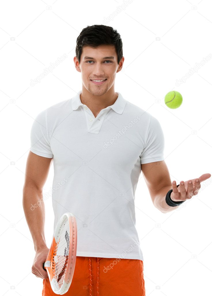 Sporty sportsman playing tennis