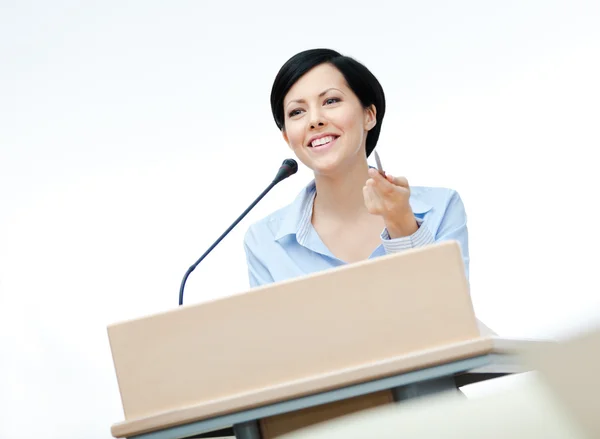 Female speech maker at the board — Stock Photo, Image