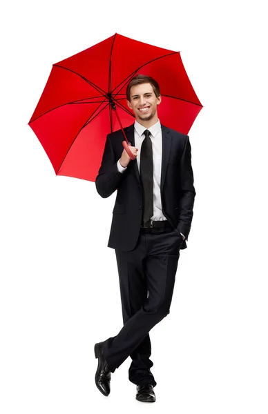 Ganztägiges Porträt eines Geschäftsmannes mit aufgerissenem Regenschirm — Stockfoto