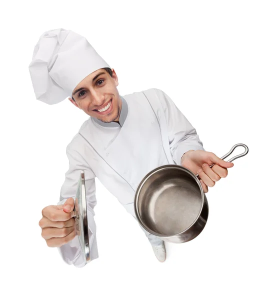 Chef kok handen een geopende stoofpot pan — Stockfoto