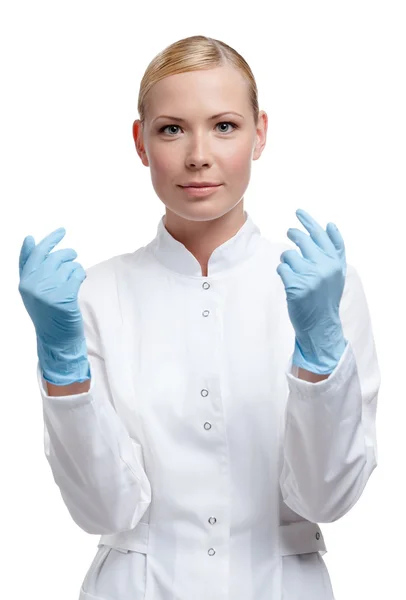 Medic puts on blue rubber gloves — Stock Photo, Image