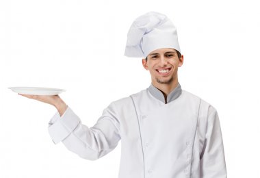 Chef cook handing a white plate