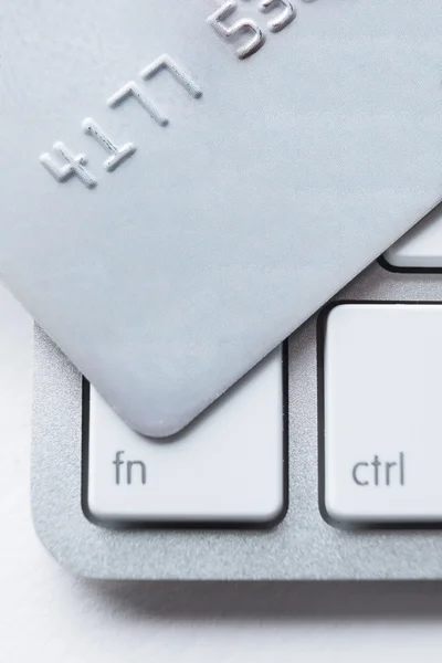 Close up of credit card on a laptop keyboard — Stock Photo, Image