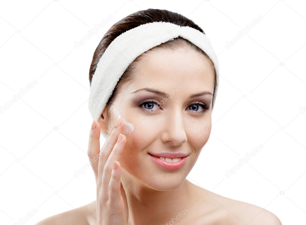 Pretty woman making face lifting procedures