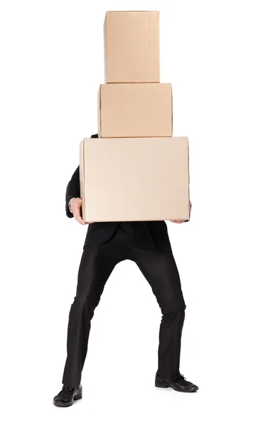 Manager handing pile of pasteboard boxes — Stock Photo, Image