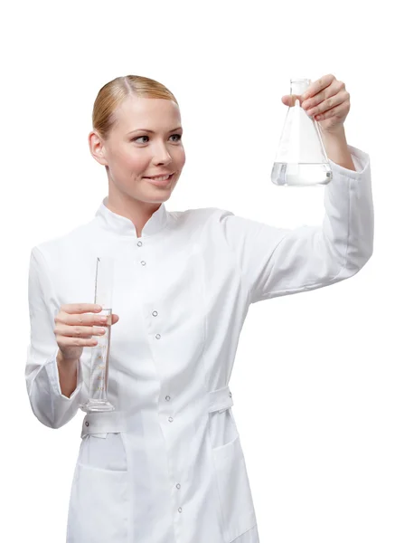 Hölgy orvos kezét mérési üveg — Stock Fotó