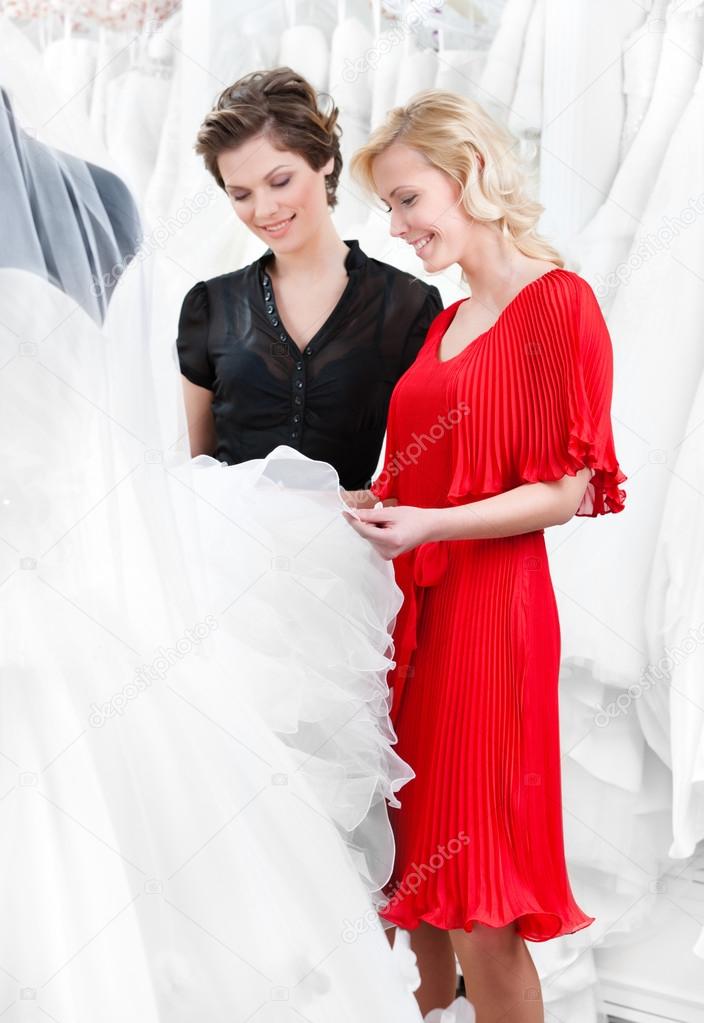 Choosing wedding dress at the bridal salon