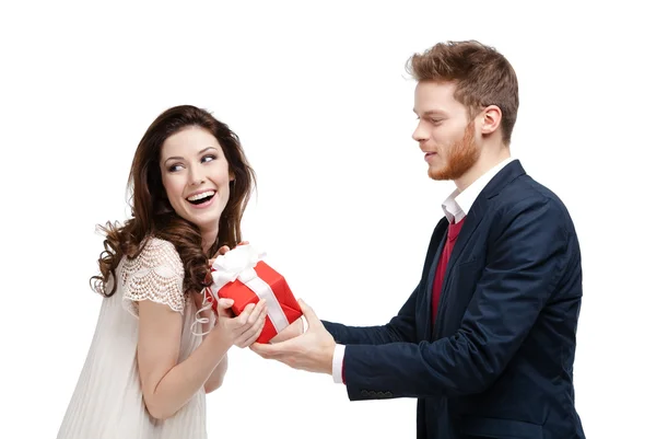 Handsome man makes present to his girlfriend — Stock Photo, Image