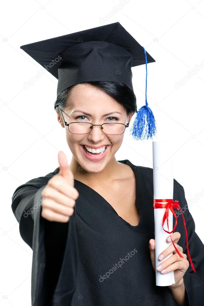 Graduating student with the certificate thumbs up